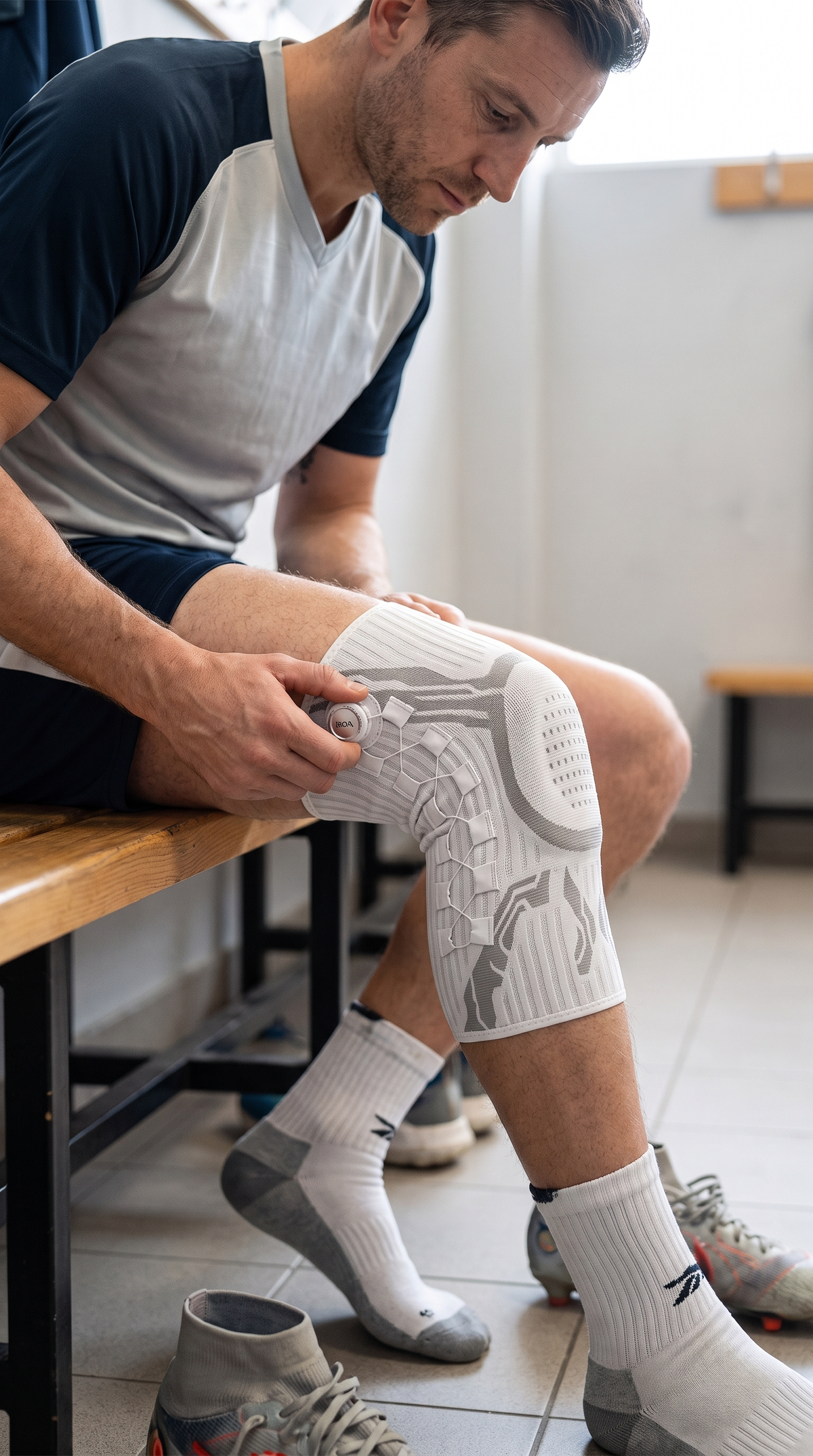 Genunchieră anti-strain cu reglaj · Susținere sport & durere